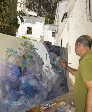 El pintor ubriqueño Juan Pedro Viruez, durante la ejecución de su cuadro, que obtuvo el noveno premio.