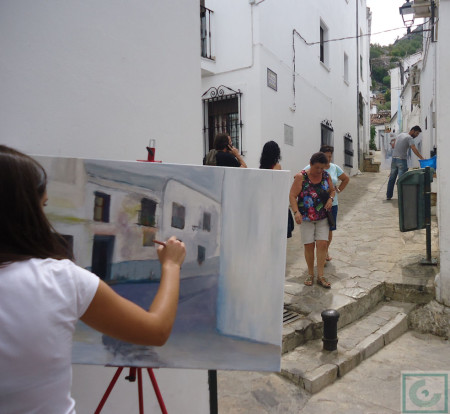 Pintora en la calle Madera.